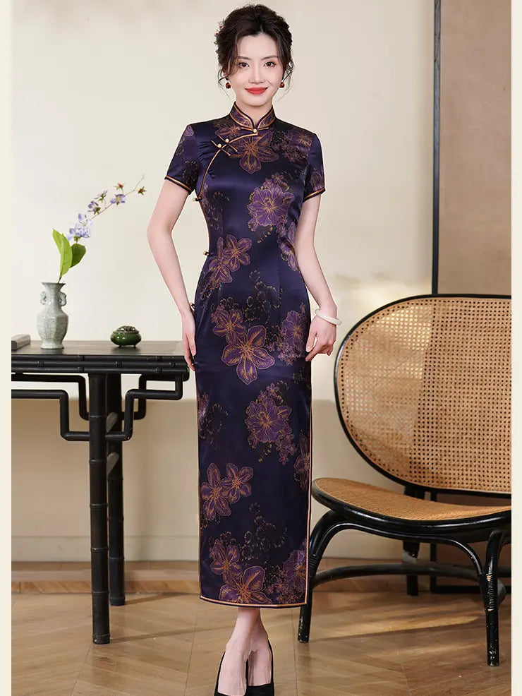 Woman wearing aDeep Amethyst Purple & Gold Floral Silk Long chinese cheongsam Qipao dress in an indoor setting.