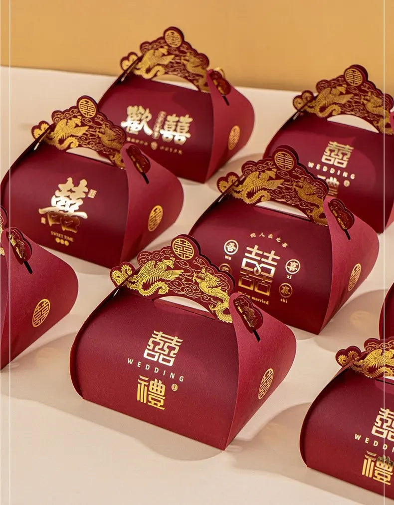 Red Dragon & Phoenix Double Happiness Chinese Wedding Favor gift boxes with gold accents on a beige background