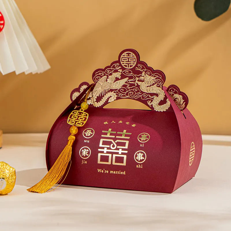 red Dragon & Phoenix Double Happiness Chinese Wedding Favor Boxes  with gold tassel and Chinese characters on a beige background