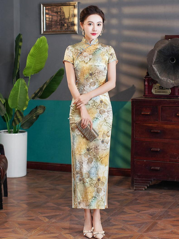 Woman in a Elegant Floral Mulberry Silk Qipao Cheongsam Dress   standing in a room with a plant and wooden dresser.