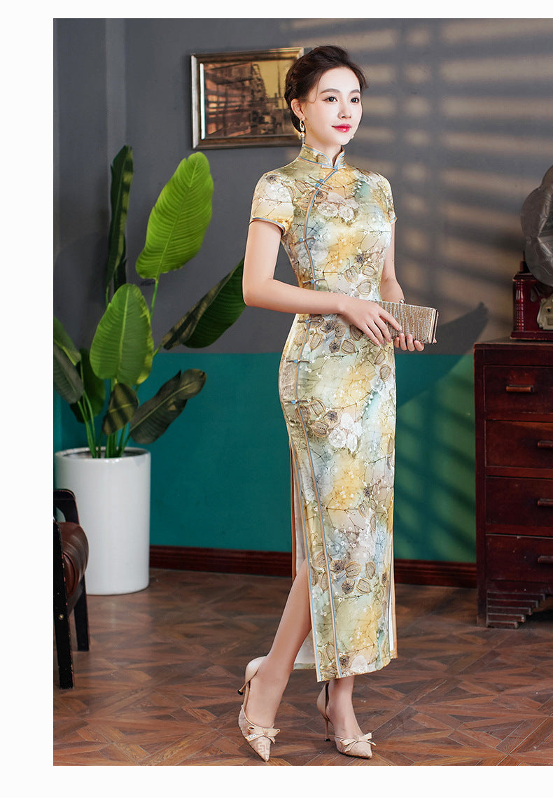 Woman in a Elegant Floral Mulberry Silk Qipao Cheongsam Dress  standing in a room with a plant and furniture.