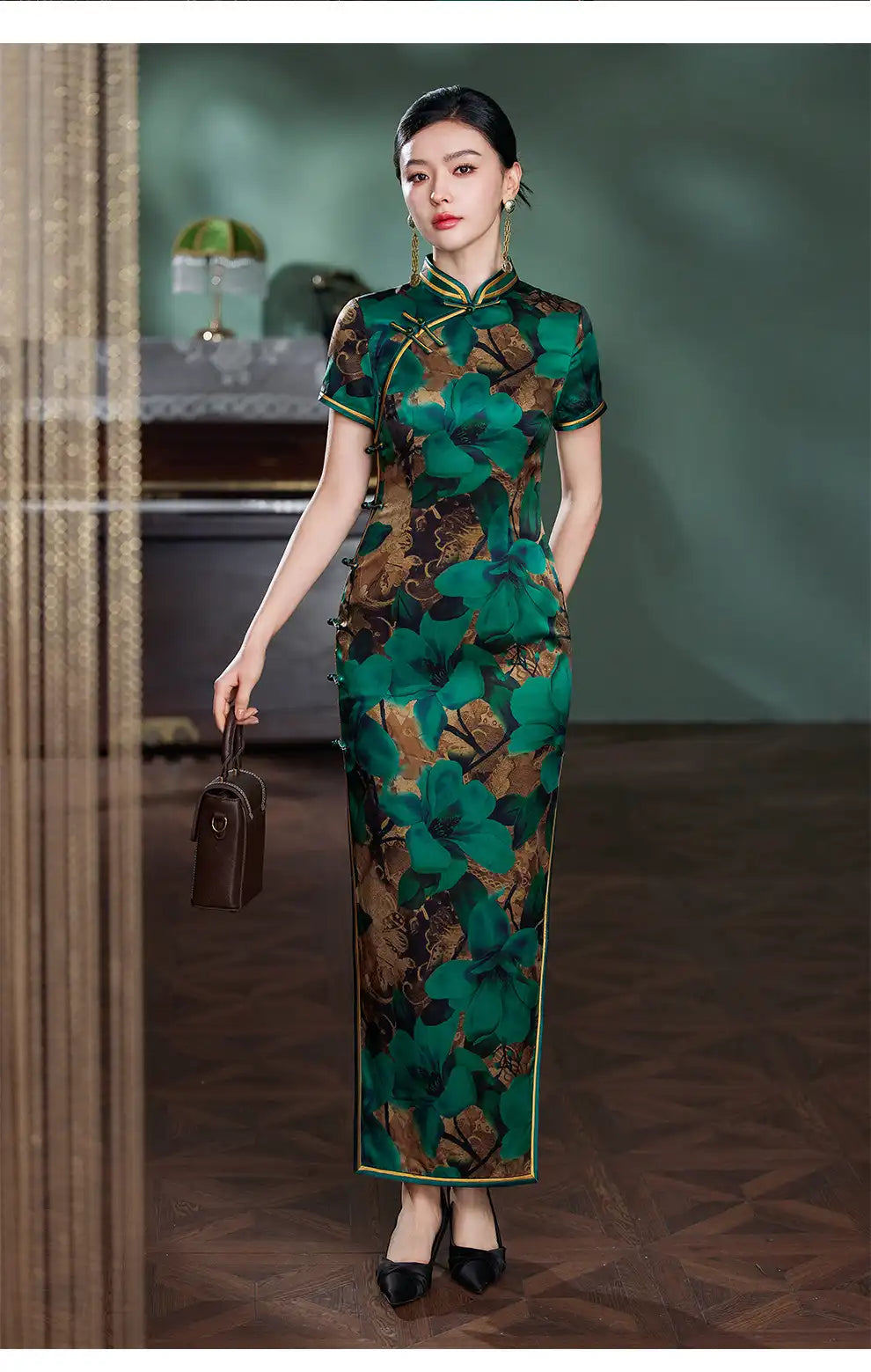 Woman wearing a Emerald Green Floral Silk Chinese Qipao Cheongsam Dress  holding a handbag indoors.