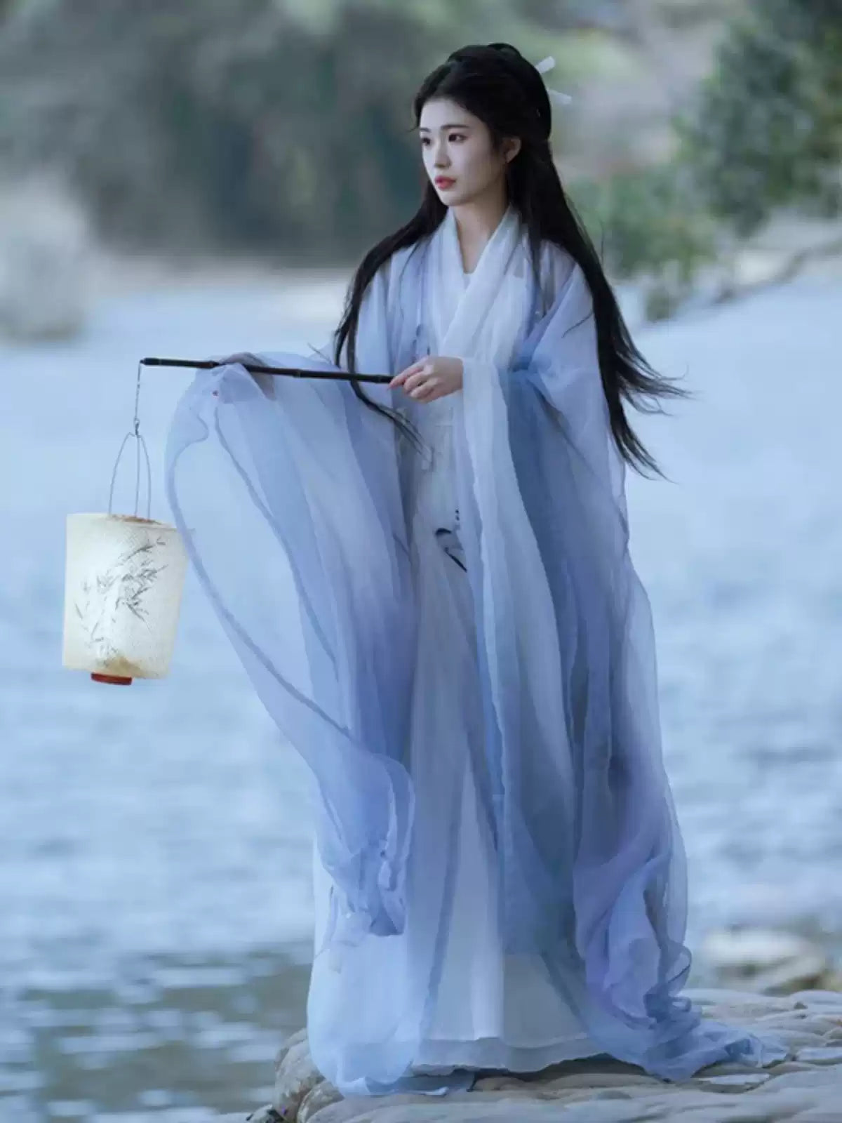ethereal blue dress Ethereal Blue Tulle Gown With Floral Accents