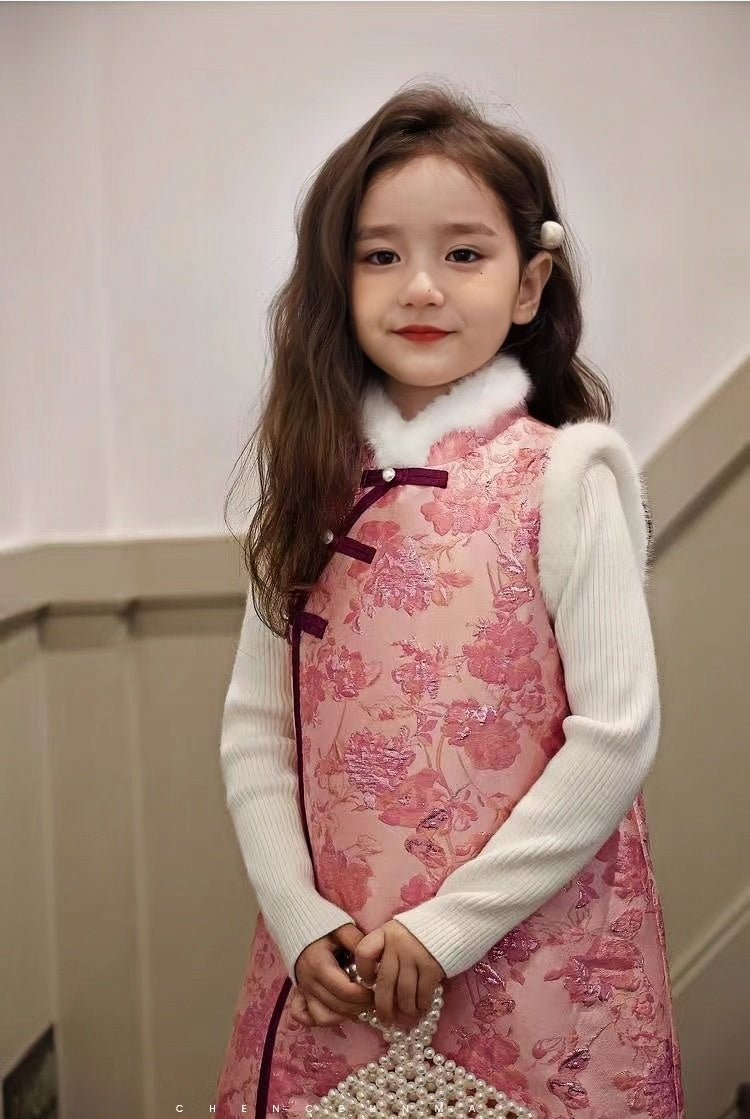 A chinese girl in winter pink vest cheongsam dress