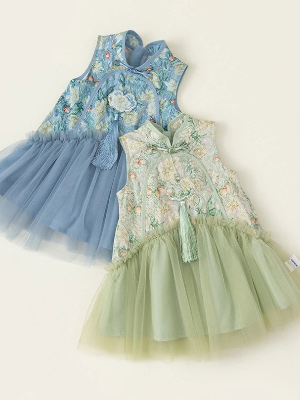 Two sleeveless toddler Girls Traditional Chinese Floral Sleeveless Tulle Qipao  dresses with floral embroidered bodices and tulle skirts, displayed on a light cream background. One dress is light blue, and the other is light green.