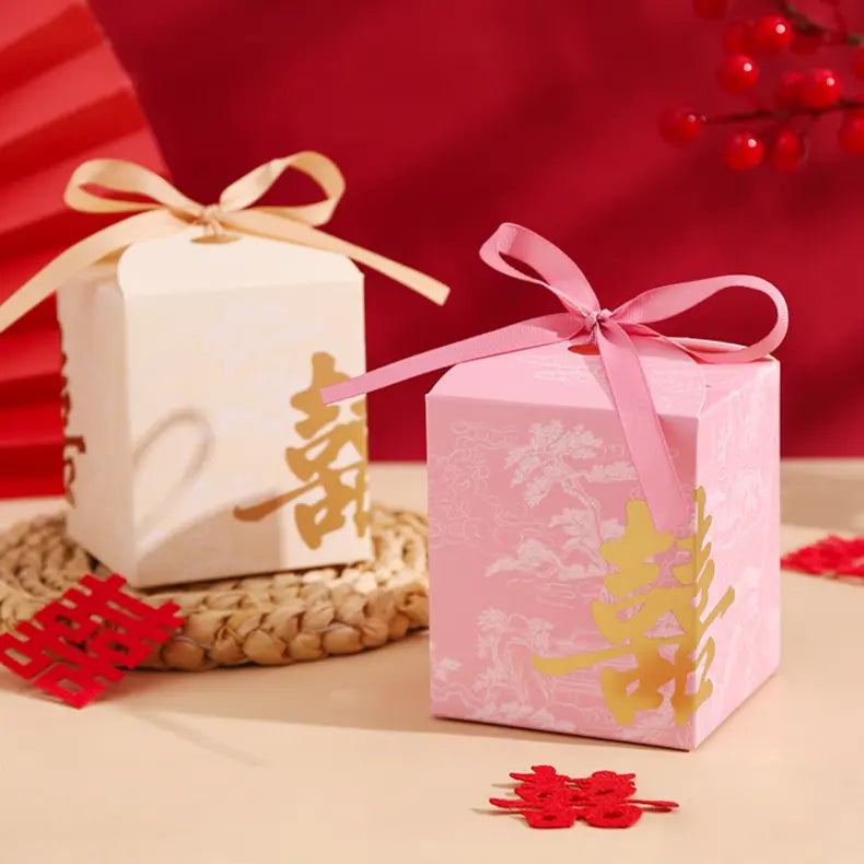 Two Gold Foil Double Happiness Chinoiserie Wedding Favor Boxes   with ribbons on a red background