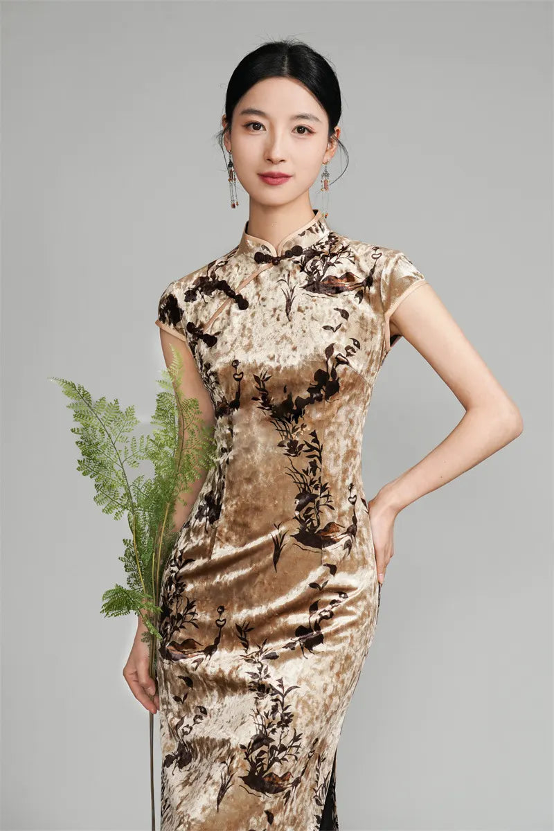 Woman wearing a Golden Floral Velvet Qipao Cheongsam Dress with a gray background