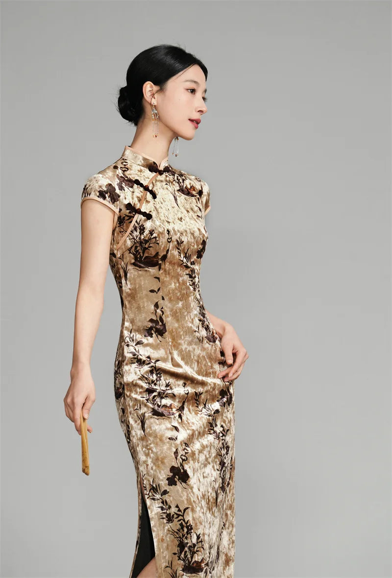 Woman wearing a Golden Floral Velvet Qipao Cheongsam Dress  on a gray background