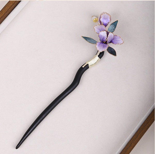 Chinese Hair stick with purple floral design on a light gray background