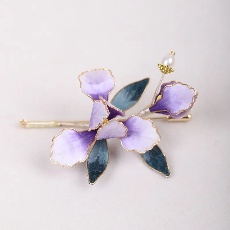 Handmade Chinese Velvet Flower Orchid Hairpin  hairpin with purple and green petals on a light background