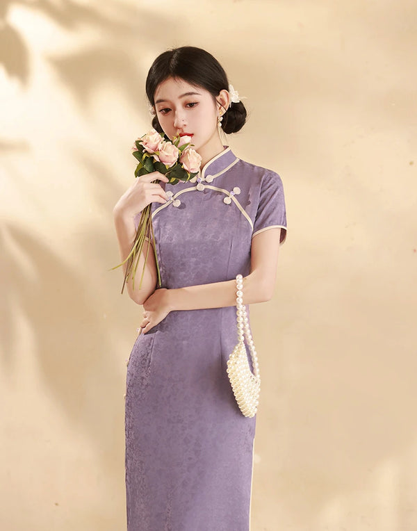 Woman in a purple Lavender Floral Short Sleeves Jacquard Qipao Dress holding flowers against a beige background