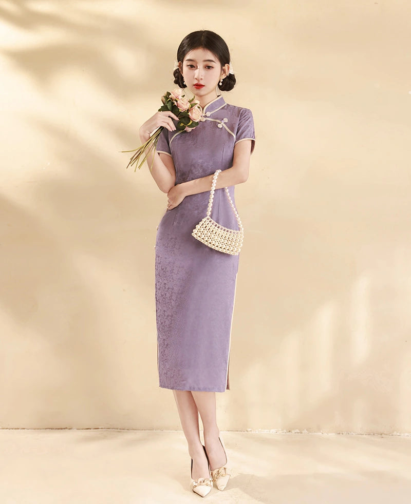 Woman in a purple Lavender Floral Short Sleeves Jacquard Qipao Dress  holding flowers against a beige background