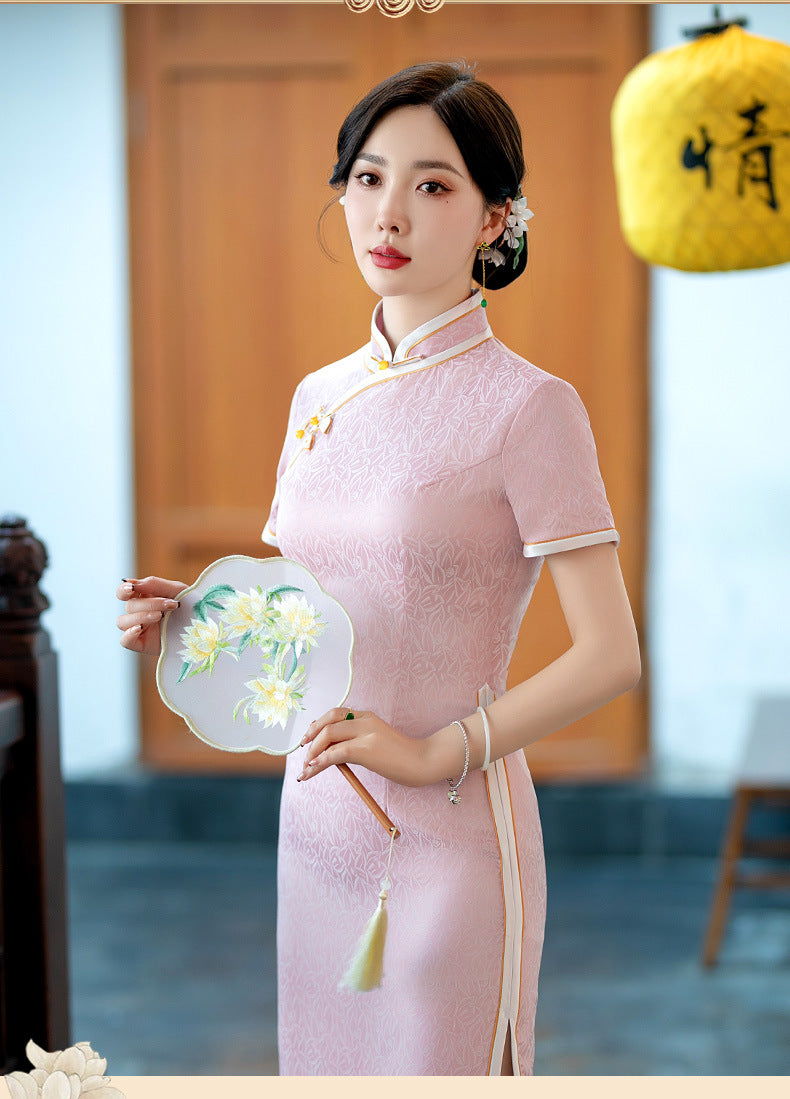  a chinese girl in Light Pink Floral Qipao Dress with hand fan