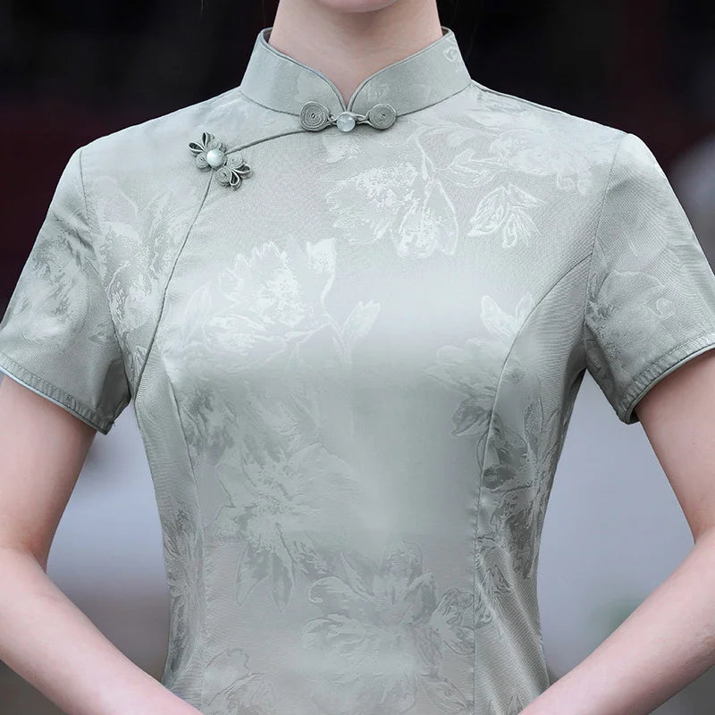 Light green traditional Modern Ao Dai Style Floral Jacquard A-Line Qipao dress with floral patterns on a blurred background