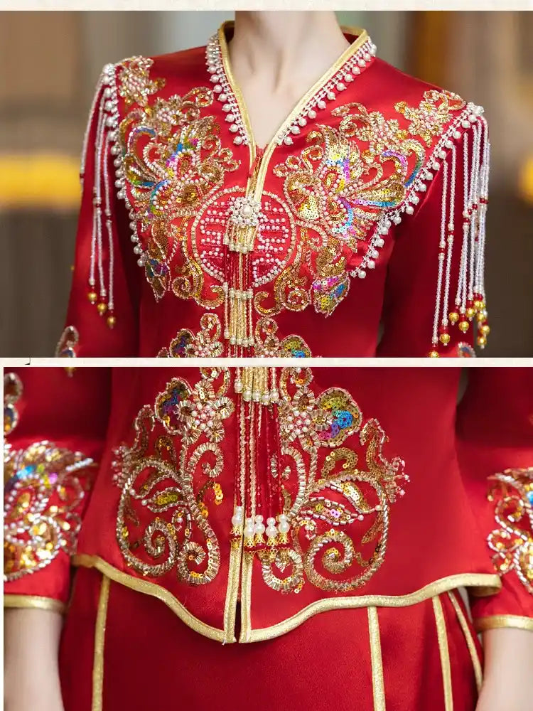 Decorative red garment with intricate gold and multicolored embroidery on a blurred background