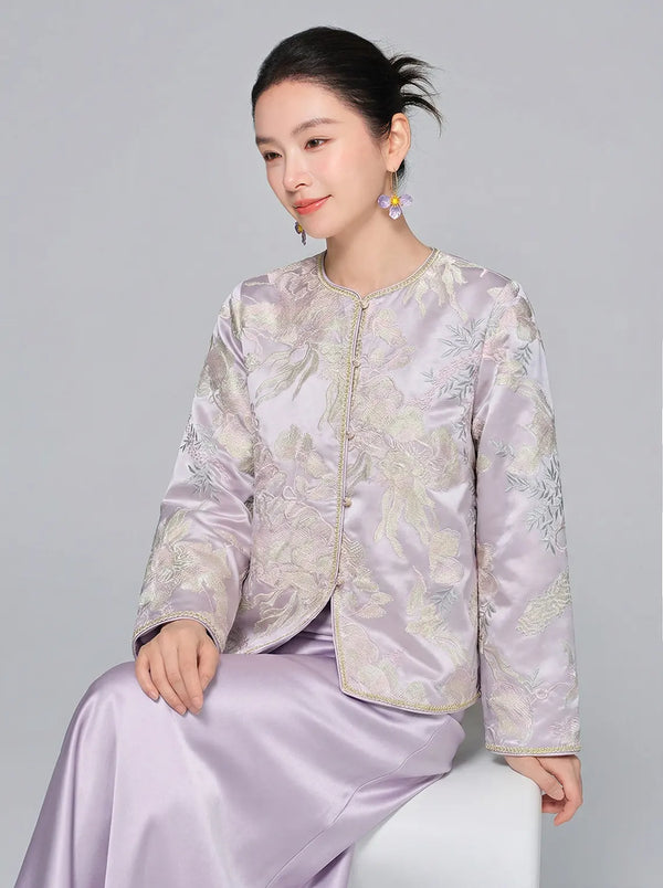 Woman wearing a light purple New Chinese Style Lilac Mist Embroidered Jacket & Satin Midi Skirt  on a gray background