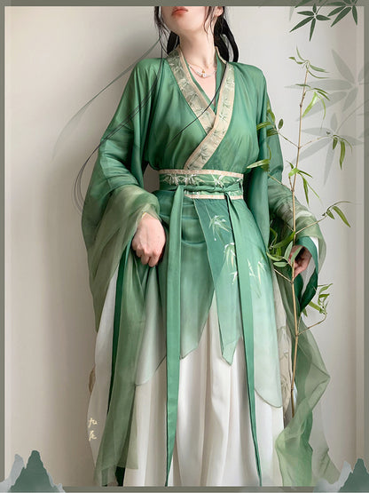 model in green bamboo leaves print hanfu cloe up