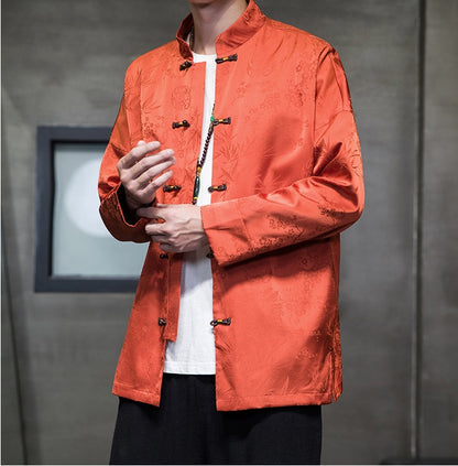 A chinese men in Orange Chinese Jacquard  Tang Jacket with frog buttons open