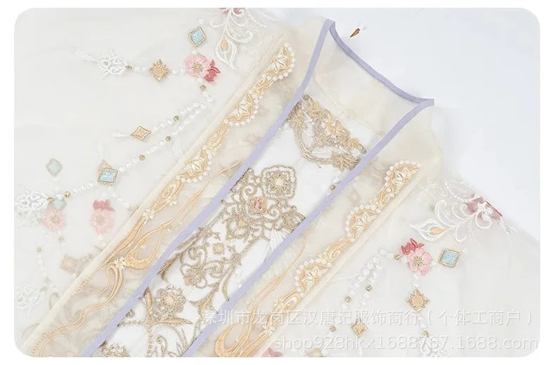 Decorative fabric with floral and geometric patterns on a white background