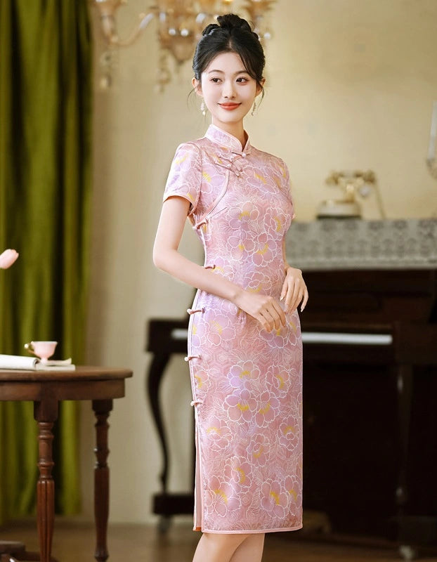 Woman wearing a Pink Floral Mullbury Silk Short Sleeves Qipao cheongsam Dress  in an elegant indoor setting