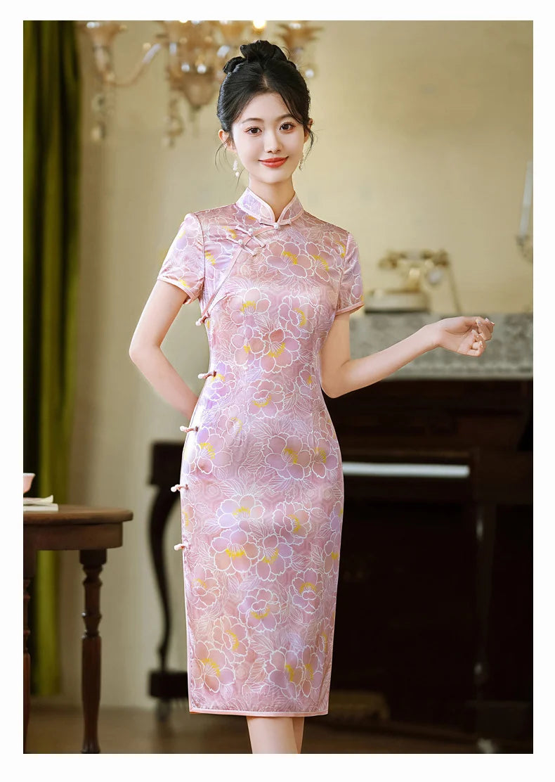 Woman wearing a Pink Floral Mullbury Silk Short Sleeves Qipao cheongsam dress in an indoor setting.