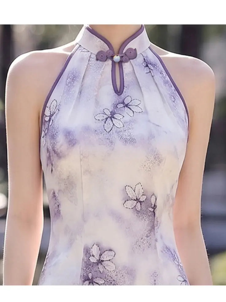 A sleeveless Purple Modern Halter Neck Floral Jacquard Qipao  cheongsam-style top with a purple and white floral print, featuring a traditional collar with a tie closure and decorative buttons.