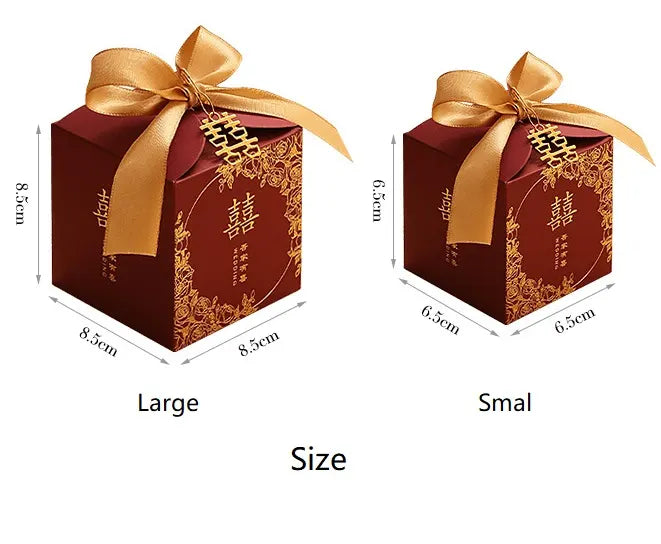 Two gift boxes with gold ribbons and measurements on a white background