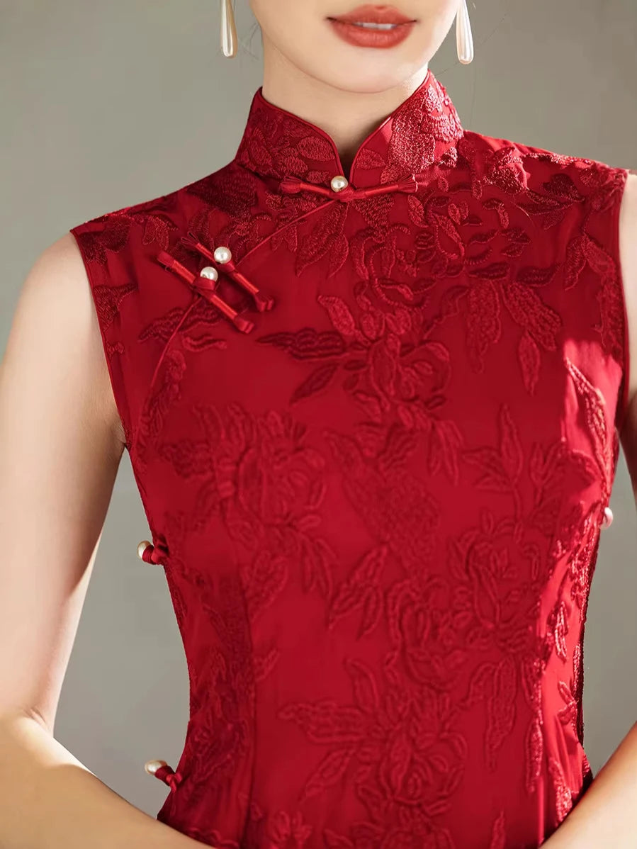 Red lace Floral Embroidery Sleeveless Qipao dress with pearl buttons on a neutral background