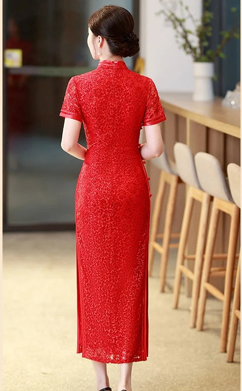 Woman wearing a Red Floral Lace Midi Qipao Cheongsam Dress  in an indoor setting with wooden furniture.