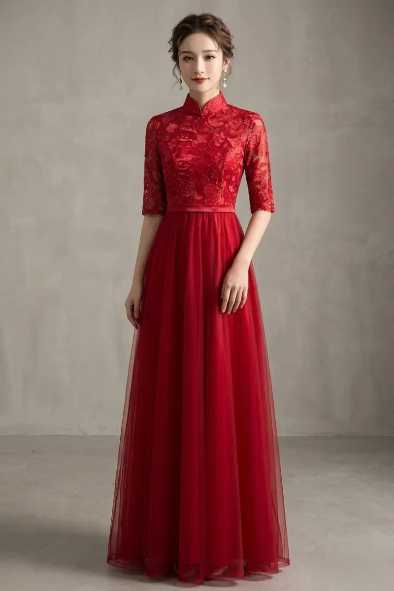 Woman wearing a Red Lace Tulle Cheongsam/Qipao Dress  against a plain background