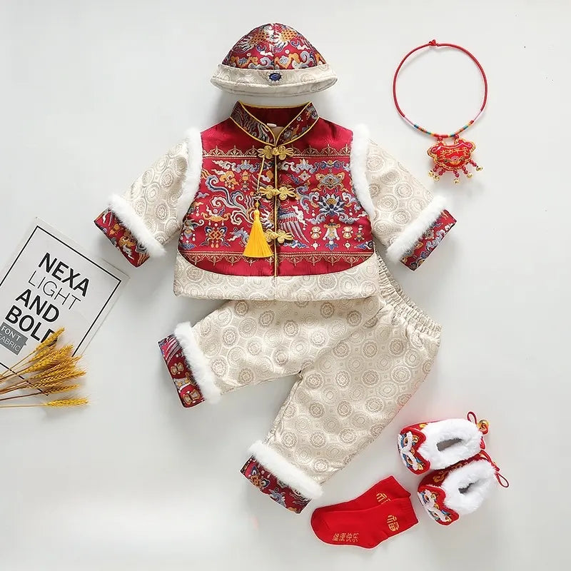 Traditional Chinese children's outfit with red and white patterns on a light gray background.