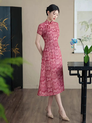 Woman wearing a Red Short Sleeves patterned  A-Line Qipao Dress standing in a room with a table and decorative items.