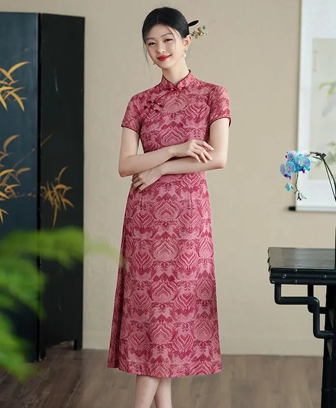 Woman wearing a Red Short Sleeves patterned  A-Line Qipao Dress  standing in a room with a decorative screen and table.