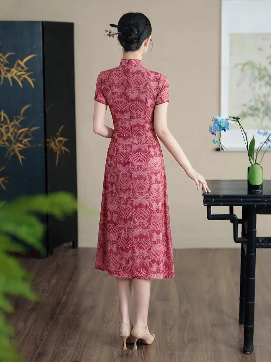 Woman in a rRed Short Sleeves patterned  A-Line Qipao Dressstanding in a room with a table and decorative elements.