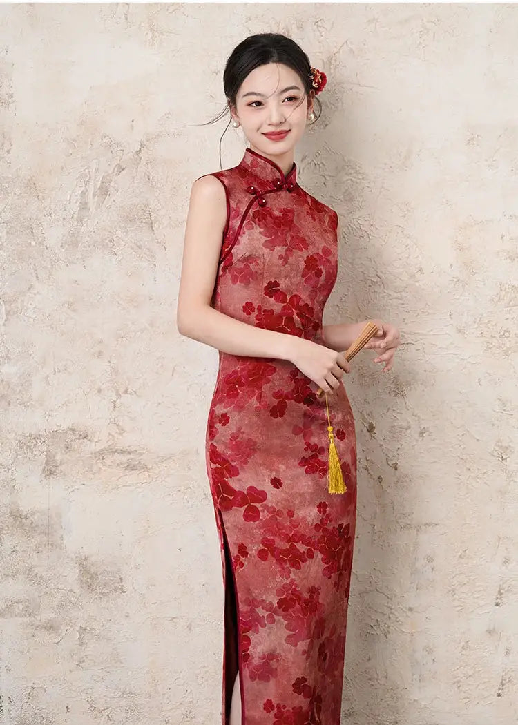 Woman wearing a Red Sleeveless Floral Qipao Dress – Modern Chinese Cheongsamagainst a beige background