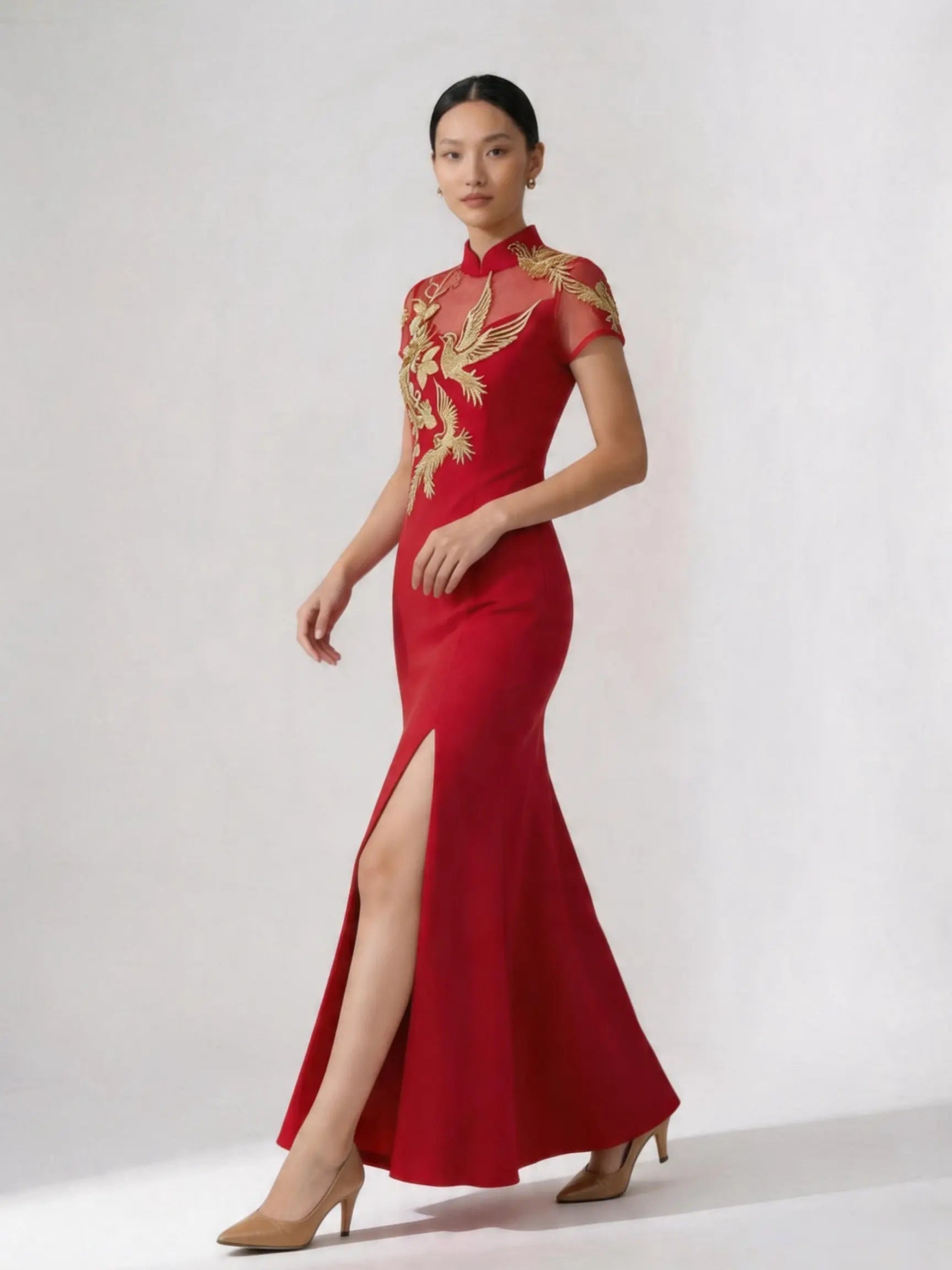 Woman wearing a Red and Golden Bird & Peony Mermaid Qipao cheongsam -Modern Chinese Wedding Tea Ceremony Gown  on a white background