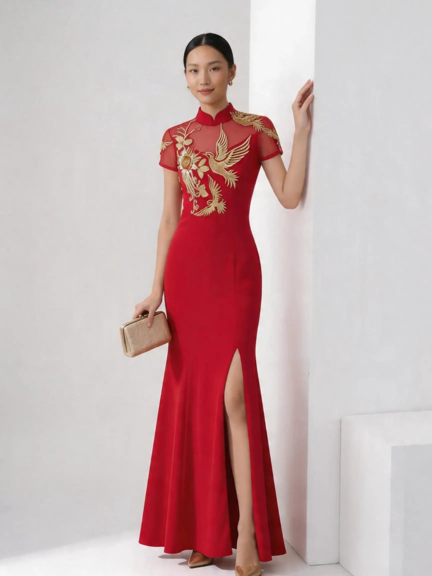 Woman wearing a Red and Golden Bird & Peony Mermaid Qipao-Modern Chinese Wedding Tea Ceremony Gown  against a white background