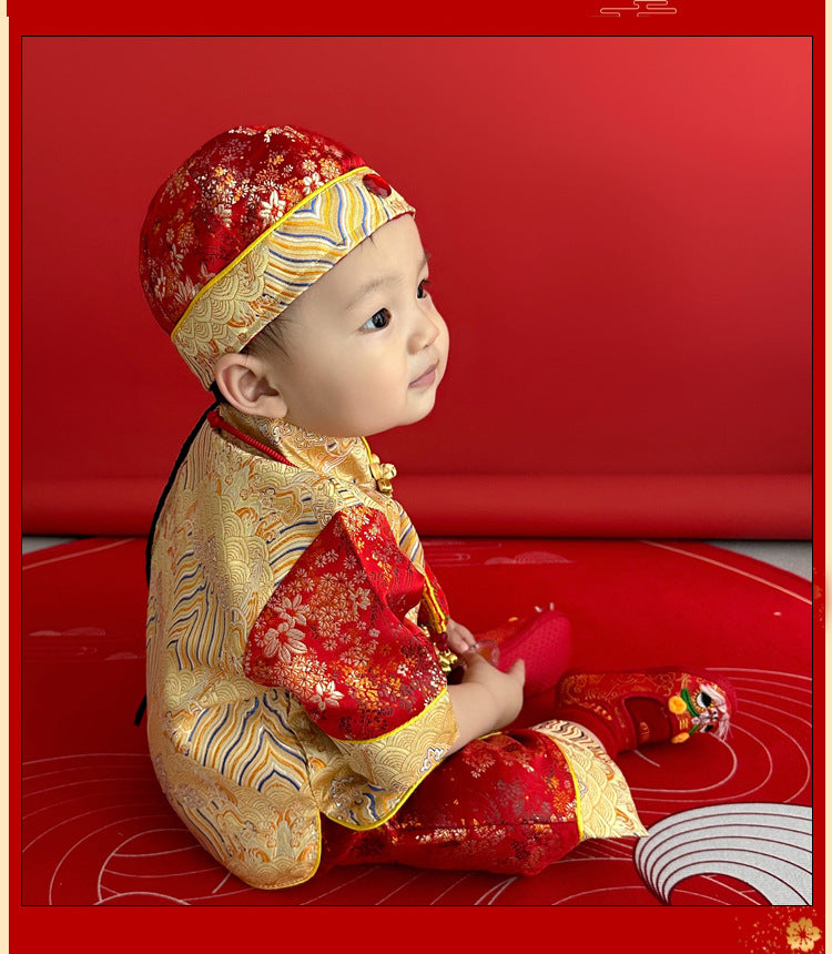 A chinese baby in short sleeves Red and Golden Tang Jacket top and pants and Traditional Hat