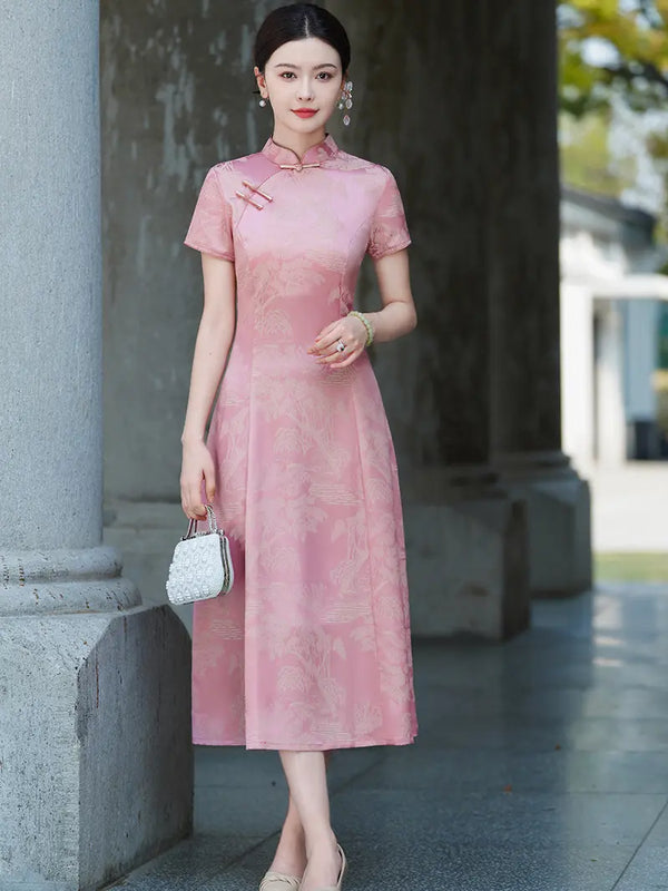 A woman wearing a short-sleeve Rose Pink Landscape Jacquard Modern A Line  midi  Qipao cheongsam dress with a subtle tonal floral pattern, standing outdoors next to a stone column.