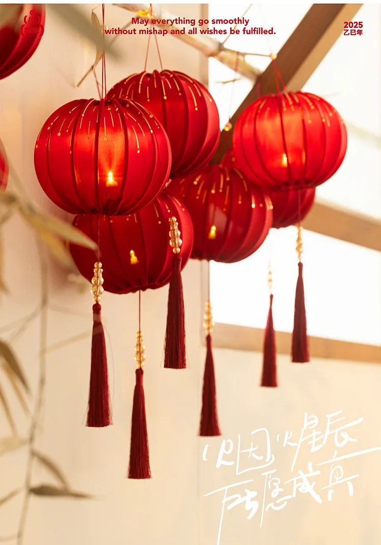 Round Red Fabric Lantern with Light and Tassels for Lunar New Year, Mid-Autumn Festival, weddings, and other celebrations.