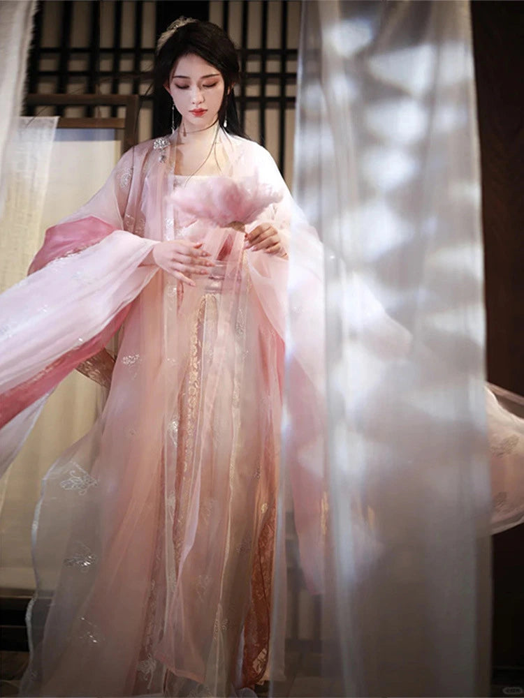 Woman in Traditional Chinese Clothing - Pink Song Dynasty Hanfu Dress with soft focus background
