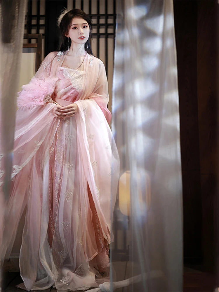 Woman in a Traditional Chinese Clothing - Pink Song Dynasty Hanfu Dress standing behind a curtain