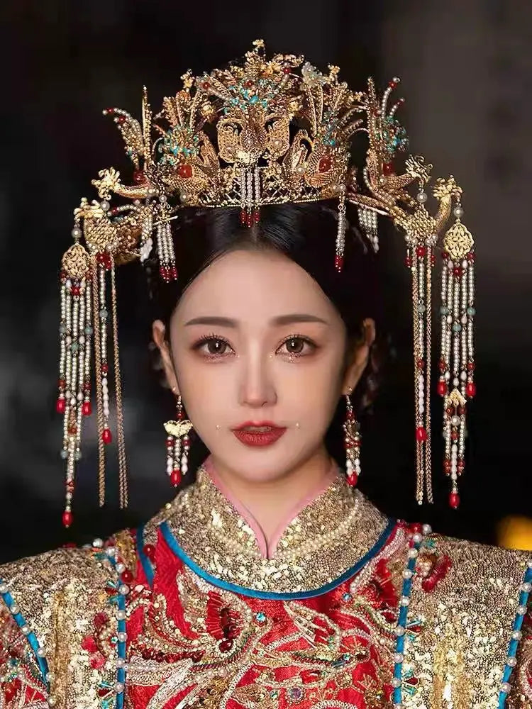 Traditional Chinese headdress with intricate design on a person wearing a matching outfit.