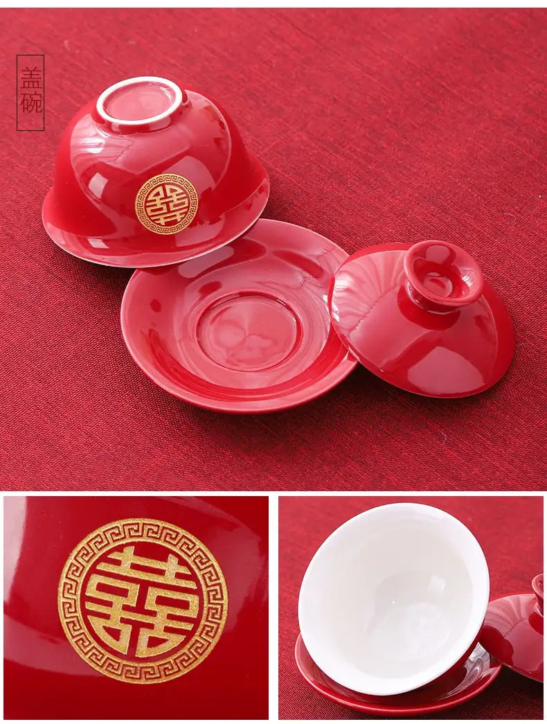 Red ceramic teacup set with 'double happiness' design on a red background