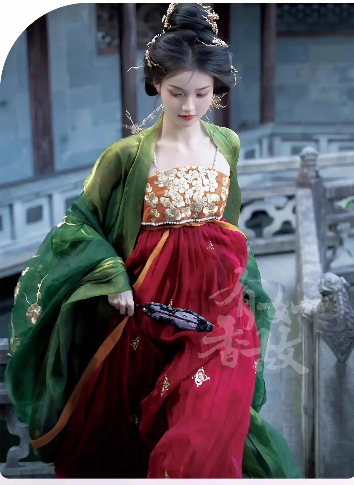 Woman in Traditional Chinese Tang Dynasty Green and red Hanfu Dress  attire standing in a historical setting