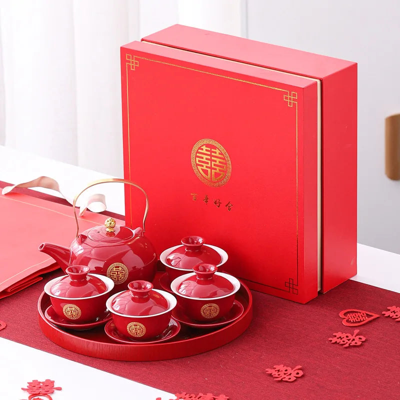Traditional Chinese Wedding Double Happiness Tea Set  with matching box on a red surface