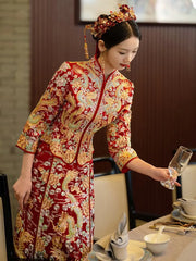 Traditional Qun Kwa two-piece outfit laid flat to show embroidery details.