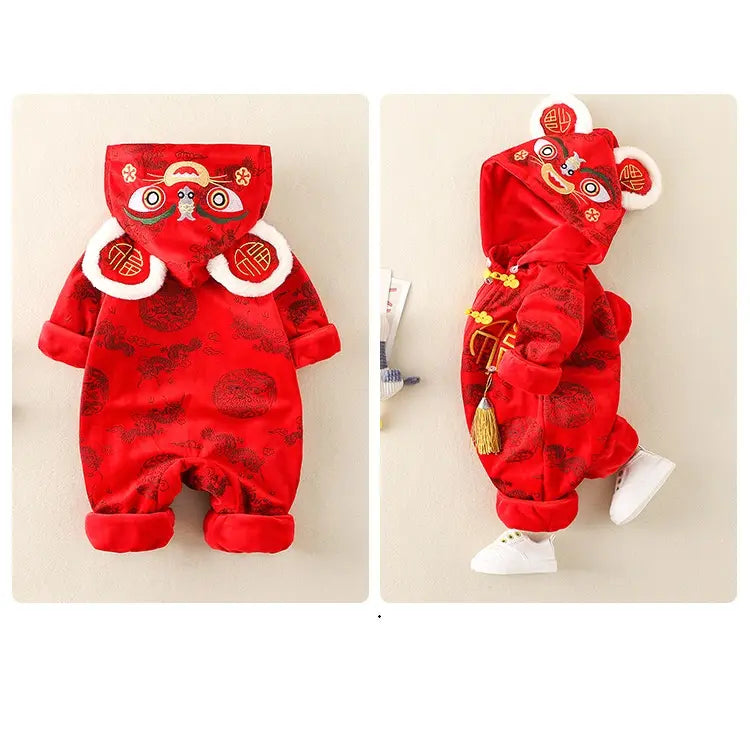 A baby red dragon tiger romper shown in two views: a front view on the left and a side view on the right. The costume is bright red with a tonal dragon pattern, featuring a hood with a lion face, white faux fur trim, and gold tassel details.