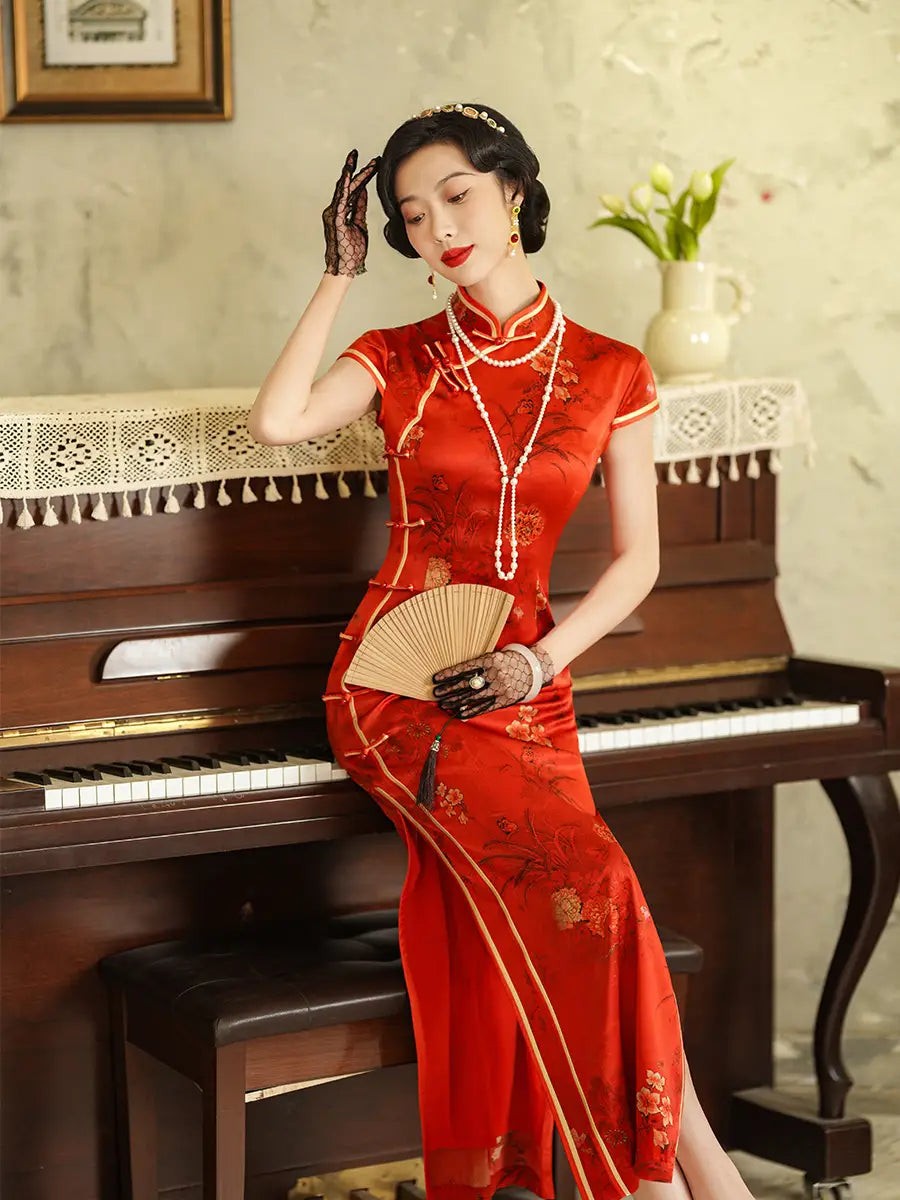 Woman in a Vintage Foral Red Silk Qipao Cheongsam Dress posing in front of a piano