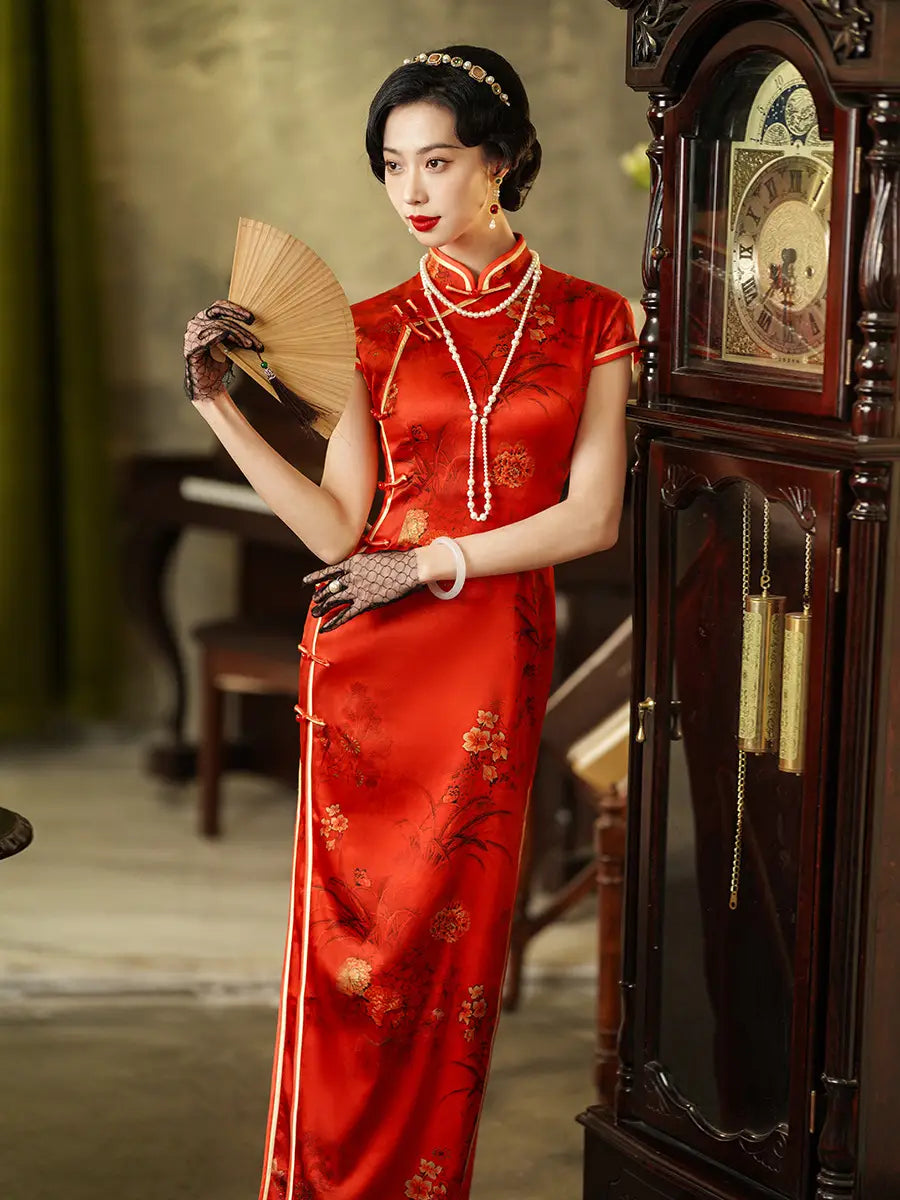 Woman in a Vintage Foral Red Silk Qipao Cheongsam Dress holding a fan next to an ornate clock.